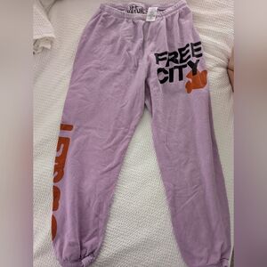 freecity Kids Lilac Joggers with Orange and Black Logo